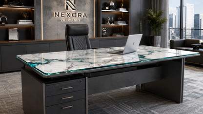 Modern office desk with marble top in a high-rise office setting, featuring the Nexora Solutions logo.
